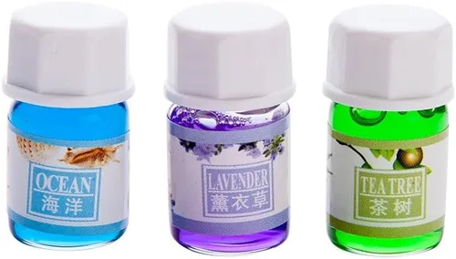 Vista 2 de Un paquete de 12 aceites aromáticos de perfume aromático en 12 aromas diferentes, 0.1 onzas líquidas cada botella