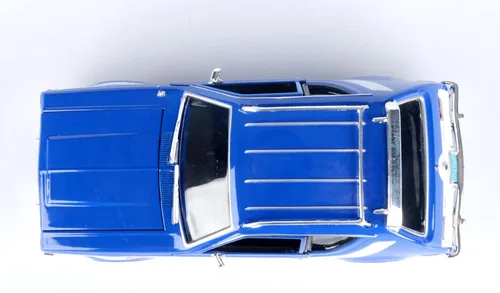 Vista 6 de Motormax 1974 AMC Gremlin X 1:24 Modelo fundido a presión Forgotten Classics Series 79045 Azul
