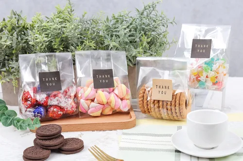 Vista 3 de LOKIQNG - Paquete de 100 bolsas de celofán, bolsas de plástico transparentes para galletas, bolsas de dulces con lazos giratorios y 100 bolsas