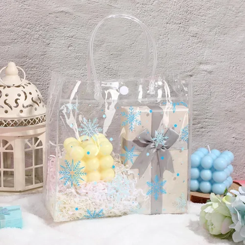 Vista 4 de Cholemy 24 bolsas de regalo de plástico transparente con diseño de copo de nieve de invierno con asas, bolsas de regalo transparentes