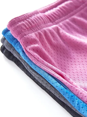 Vista 7 de Paquete de 4 pantalones cortos deportivos para niñas con bolsillos, pantalones cortos de correr de 3 pulgadas para niños, adolescentes, fútbol