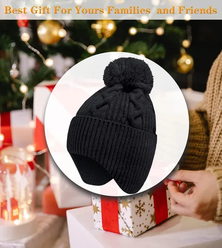 Vista 2 de KMOLY Gorro de punto de invierno para mujer con pompones, gorro de calavera cálido con solapas para las orejas para mujer