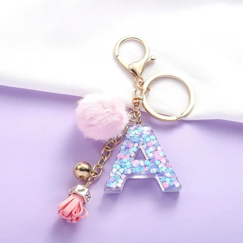 Vista 3 de OKAICEN Llavero con letra inicial del alfabeto de resina rosa y morado para mujer, bolso con pompón de piel