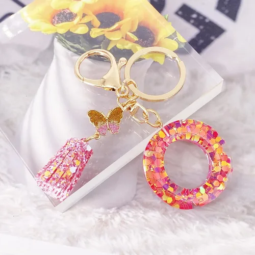 Vista 3 de LAXPICOL Llavero naranja rosa de la A a la Z para mujer, monedero, bolso de mano, mariposa, rosa, lentejuelas de resina, alfabeto, letra inicial