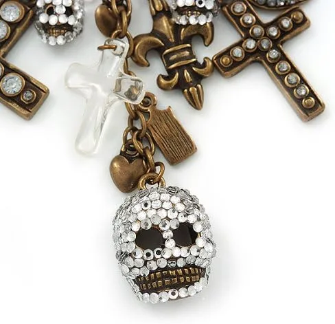 Vista 2 de Broche de seguridad con dije de cruces, corazones y calaveras en metal con acabado de bronce -, Latón, Sin gemas.