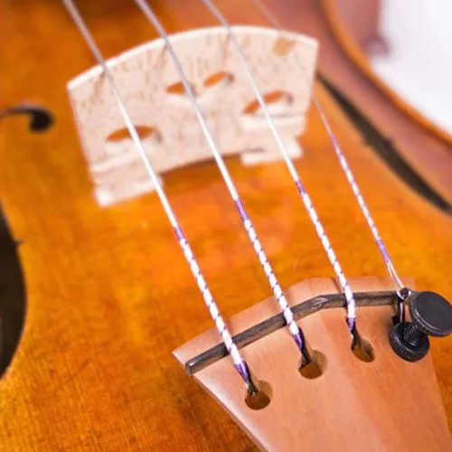 Vista 3 de Fiddlerman set de cuerdas para violín, centro sintético con terminación Ball-End para tamaños 4/4 y 3/4
