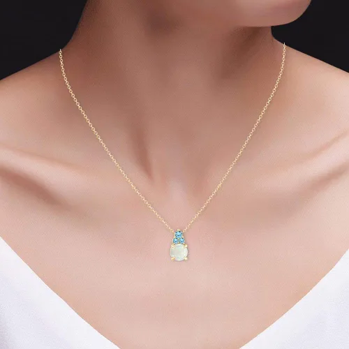 Vista 8 de Colgante redondo de ópalo blanco natural y topacio azul suizo con piedras preciosas y aretes colgantes en oro de 14 quilates sobre plata de ley
