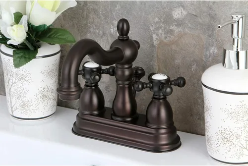 Vista 2 de Kingston Brass KB1605BX - Grifo de baño central de 4 pulgadas, bronce aceitado Heritage collection; Double-handle; With pop-up drain; Solid brass
