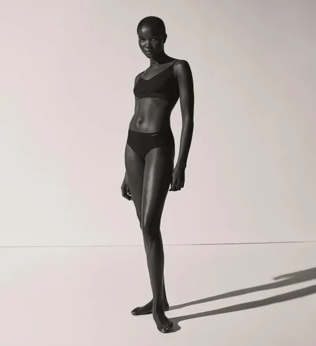 Vista 3 de Calvin Klein Brasier de bralette triangular, sin costuras, invisibles, cómodo, con forro ligero y sin costuras para mujer, Negro