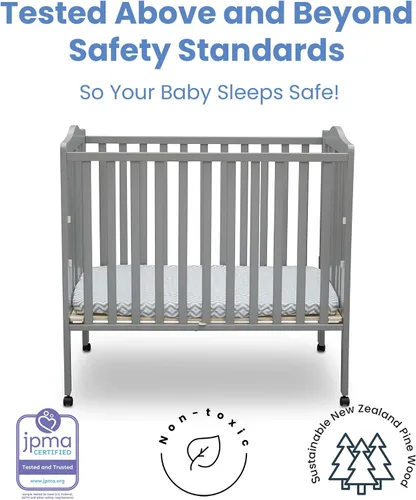Vista 4 de Delta Children Cuna portátil plegable mini para bebé con colchón de 1.5 pulgadas - Certificado Greenguard Gold, gris