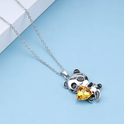 Vista 5 de YienDoo Gargantilla de cristal con diseño de panda, collar de corazón de cristal amarillo, panda con colgante de oso panda, collar de amor