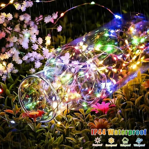 Vista 4 de QITONG Luces solares de Navidad multicolor para exteriores, paquete de 2 unidades de 200 luces LED solares de 66 pies cada uno, alambre plateado