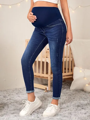 Vista 5 de Floerns Pantalones de mezclilla de maternidad de cintura alta con dobladillo rasgado, con bolsillo para mujer