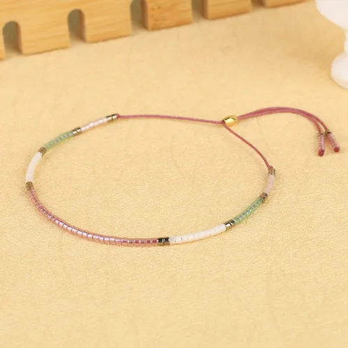 Vista 3 de KELITCH 10 pulseras elásticas de la amistad con borlas