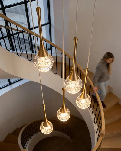 Vista 8 de Candelabro de 5 luces de cristal cepillado dorado, regulable, con forma de gota de lluvia, lámpara colgante en espiral ajustable de lujo