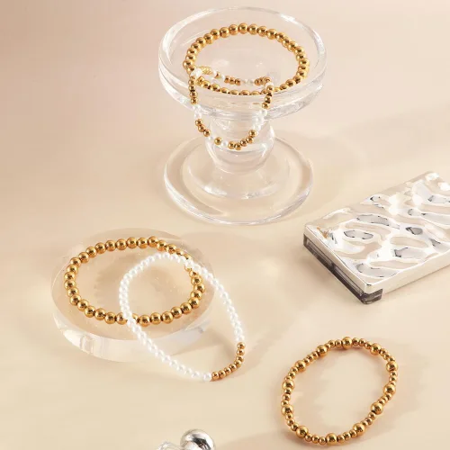 Vista 5 de KIWISE Pulseras de cuentas de oro para mujer, chapado en oro de 18 quilates, apilables, elásticas, juego de pulseras de bolas de cuentas, regalos