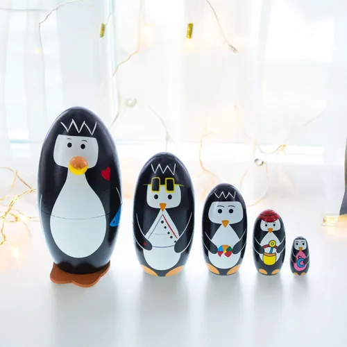 Vista 2 de BestPysanky Juego de 5 muñecas de madera de pingüinos de 5 pulgadas
