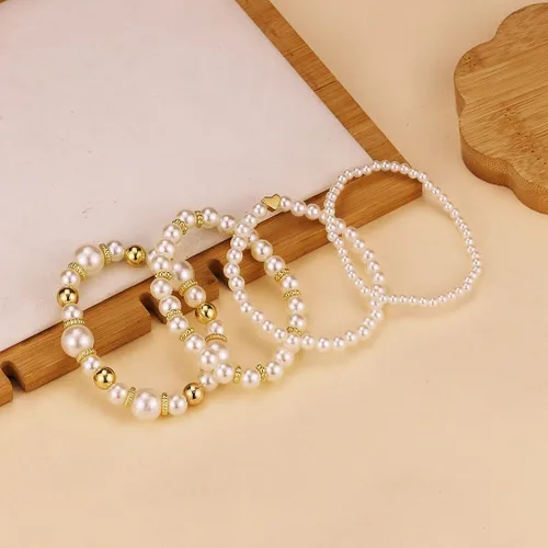 Vista 5 de Pulseras de perlas para mujer, pulsera de perlas de imitación con cuentas de perlas blancas, juego de pulseras elásticas apilables, pulseras