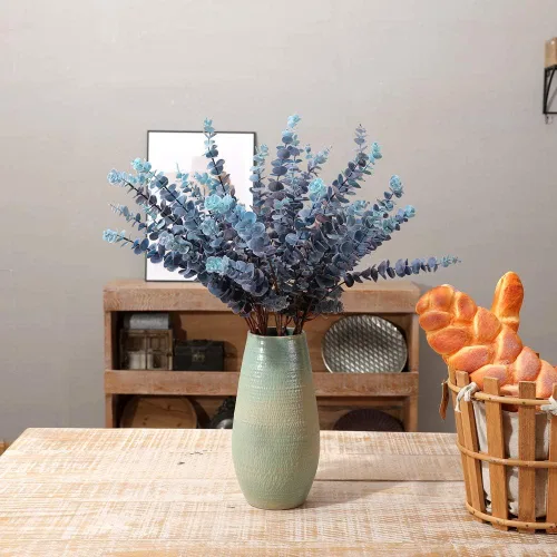 Vista 5 de 3 piezas de hojas de eucalipto artificiales de tacto suave de 31.5 pulgadas, tallos de vegetación de dólar de plata falsos para el hogar, boda Azul