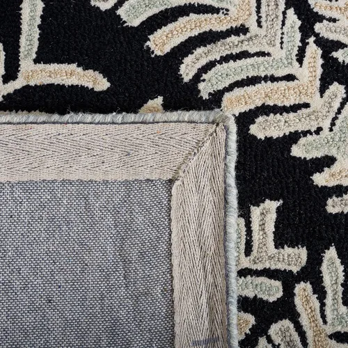 Vista 3 de SAFAVIEH Capri Collection - Alfombra de área de 9 x 12 pies, color negro y marfil, lana hecha a mano, ideal para zonas de alto tráfico en sala