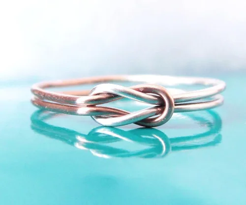 Vista 2 de Anillo de doble nudo de amor de plata de ley y oro rosa