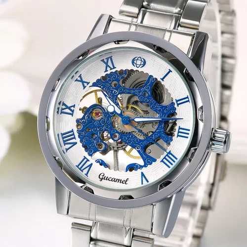 Vista 2 de Jewelrywe - Reloj de pulsera mecánico para hombre y hombre, esfera azul esqueleto, correa de acero inoxidable, mecanismo de viento a mano