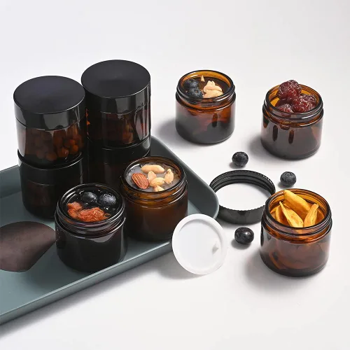 Vista 3 de Paquete de 4 tarros de vidrio de 1 onza con tapas, tarros de vidrio ámbar Tecohouse con tapas y calcomanías, contenedor de maquillaje redondo vacío