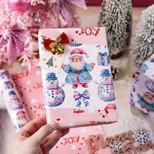 Vista 5 de Homeral Rollo de papel de regalo de Navidad, Papá Noel, muñeco de nieve y lazo y bastones de caramelo rosados, envoltura de regalo reversible