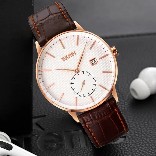 Vista 4 de FANMIS Reloj de pulsera analógico de cuarzo súper fino unisex clásico unisex de acero inoxidable ultra fino caso de negocios, Marrón
