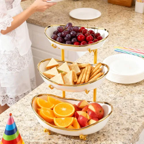 Vista 5 de jessie Cuencos de frutas de 3 niveles para encimera de cocina, soporte de cerámica grande para cestas de frutas, bandeja de metal para servir Dorado