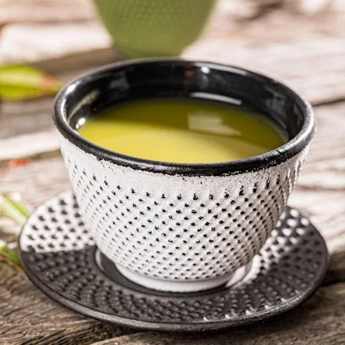 Vista 3 de Restaurantware -Platillos de 3.75 pulgadas para tazas de té, 2 platillos redondos para tazas de té japonesas tradicionales - Diseño de hoño, no se