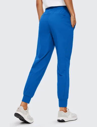 Vista 2 de CRZ YOGA Pantalones deportivos de cintura alta con bolsillos para mujer, de 27.5 pulgadas, ligeros, para entrenamiento, viajes, uso casual, al aire