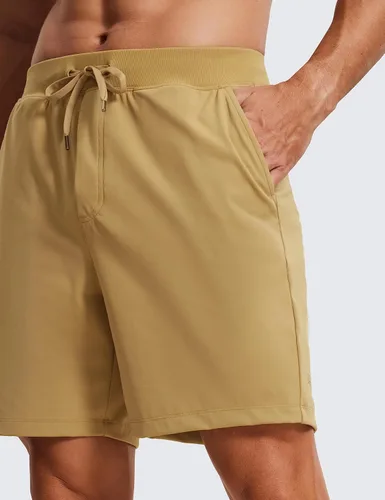 Vista 5 de CRZ YOGA Pantalones cortos de entrenamiento elásticos en cuatro direcciones para hombre, 7 pulgadas, suaves, duraderos, casuales, con bolsillos