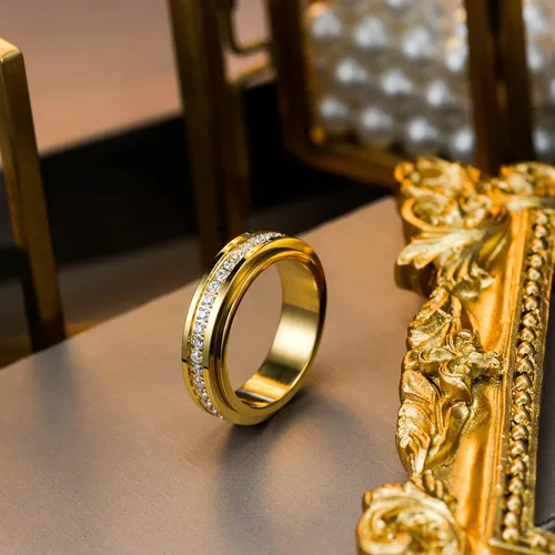 Vista 3 de Kainier Anillos de ansiedad chapados en oro de 14 quilates piedras de circonita cúbica anillos giratorios para mujeres y hombres anillos