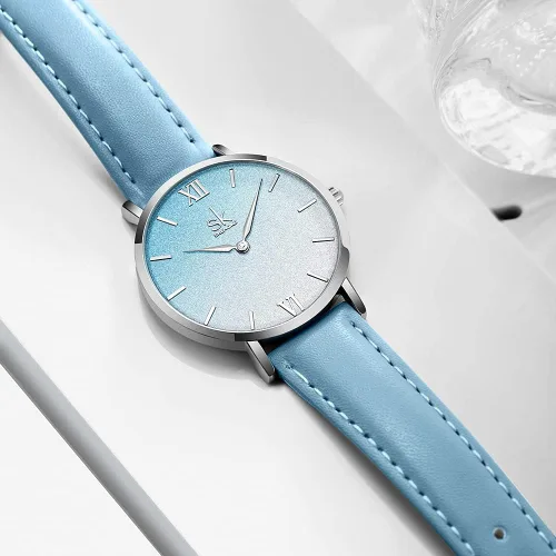 Vista 4 de SK Shengke - Reloj ultra delgado de creativo diseño minimalista, floral o de cielo estrellado con extensibles de piel genuina o acero