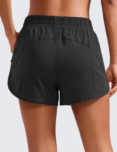Vista 2 de CRZ YOGA Pantalones cortos para correr para mujer, talle alto, con bolsillo con cremallera, forro de malla, entrepierna de 3 pulgadas, dobladillo