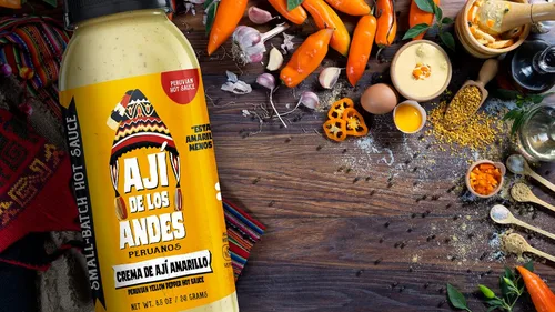 Vista 3 de Aji de los Andes Peruanos Crema de Ají Amarillo 8.0 oz "Eleva tus comidas con el auténtico sabor de nuestra salsa de pimiento picante amarillo