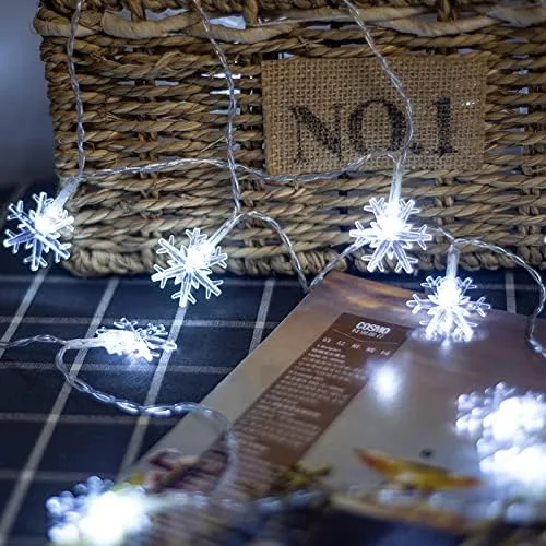 Vista 4 de Decoraciones de Navidad, guirnalda de 40 luces LED de copo de nieve de 19.6 pies, funciona con pilas, luces de Navidad impermeables para Navidad