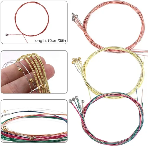 Vista 2 de Paquete de 3 cuerdas de guitarra acústica (oro, latón, multicolor) con púas de guitarra de celuloide, kit de bobinadora de cuerdas