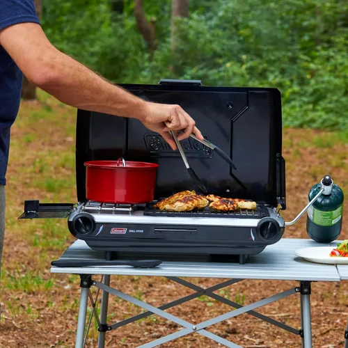 Vista 5 de Coleman Parrilla/estufa de campamento 2 en 1 de mesa, parrilla y estufa de propano de 2 quemadores con quemadores ajustables y 20,000 BTU