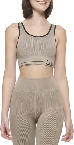 Vista 5 de Calvin Klein Performance Women's Medium Impact Sports Bra with Removable Cups Color beige.
