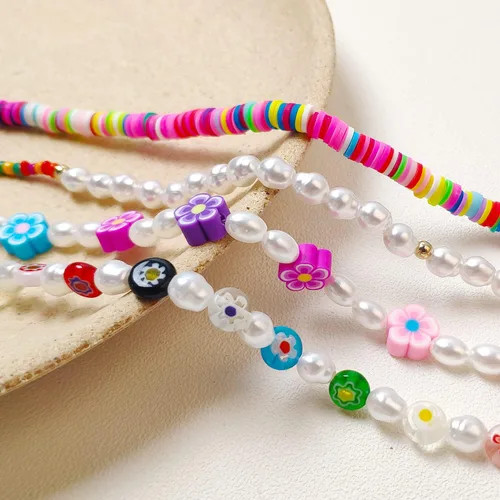 Vista 3 de Collares largos de perlas para mujeres y hombres, multicapa de perlas de imitación de color blanco crema