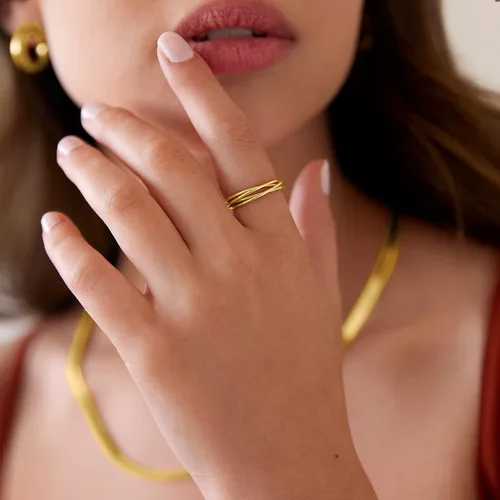 Vista 2 de PAVOI Anillo de ansiedad chapado en 14 quilates entrelazado para mujeres y hombres, anillo de oro apilable