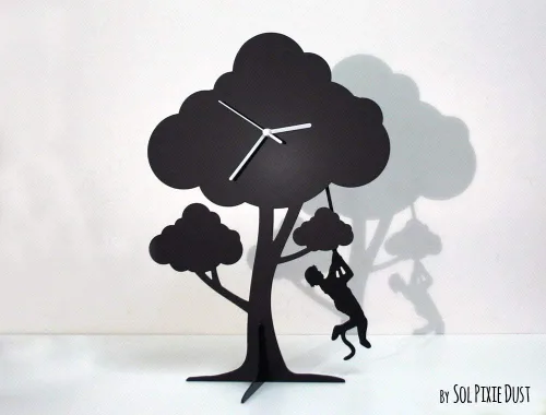 Vista 2 de The Giving Tree - Girl Swinging - Silhouette Pendulum Table Clock