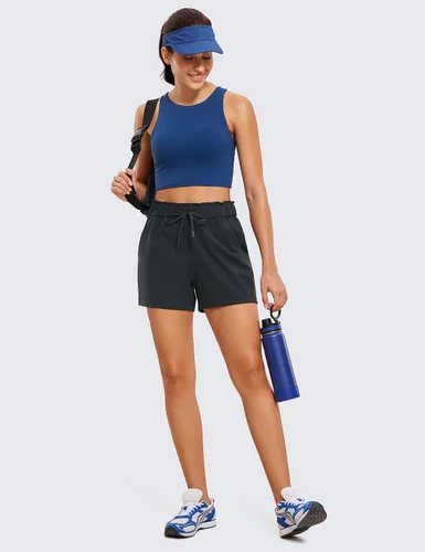 Vista 3 de CRZ YOGA Pantalones cortos deportivos elásticos en 4 direcciones para mujer, cintura alta, cómodos para el trabajo, entrenamiento casual, golf