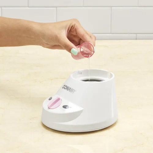 Vista 3 de Sistema de sauna facial con vapor hidratante True Glow de Conair, rosa/crema
