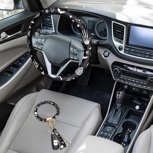Vista 2 de Juego de 4 piezas de accesorios para auto con estampado de lunas negras y estrellas blancas, funda para volante con estampado de lunas negras