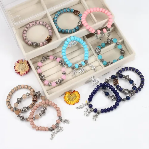 Vista 3 de Twinfree Pulseras bohemias para mujer, pulsera elástica de cuentas de colores multicapa con dije de joyería