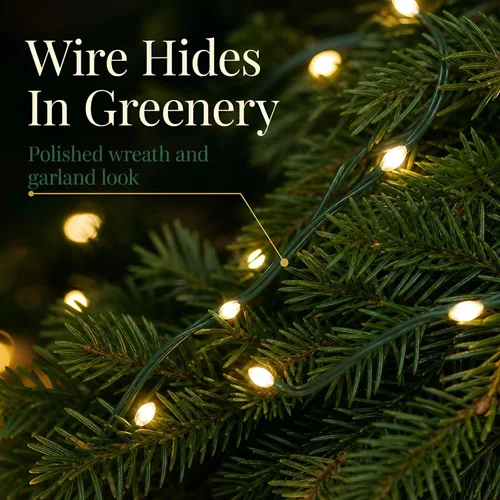 Vista 3 de Luces de Navidad al Aire Libre de QBIS - Cadena de Luces de Hadas que Funcionan con Pilas con Pequeñas LED Blancas Cálidas, Cable Verde