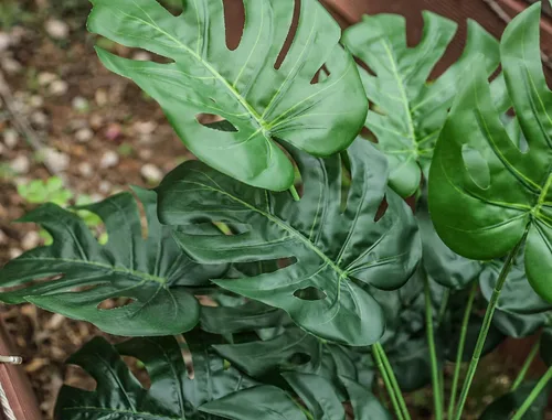 Vista 6 de Toopify Plantas falsas de 28 pulgadas, Monstera artificial en maceta negra Café